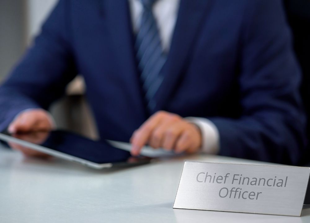 Chief Financial Officer at his desk 